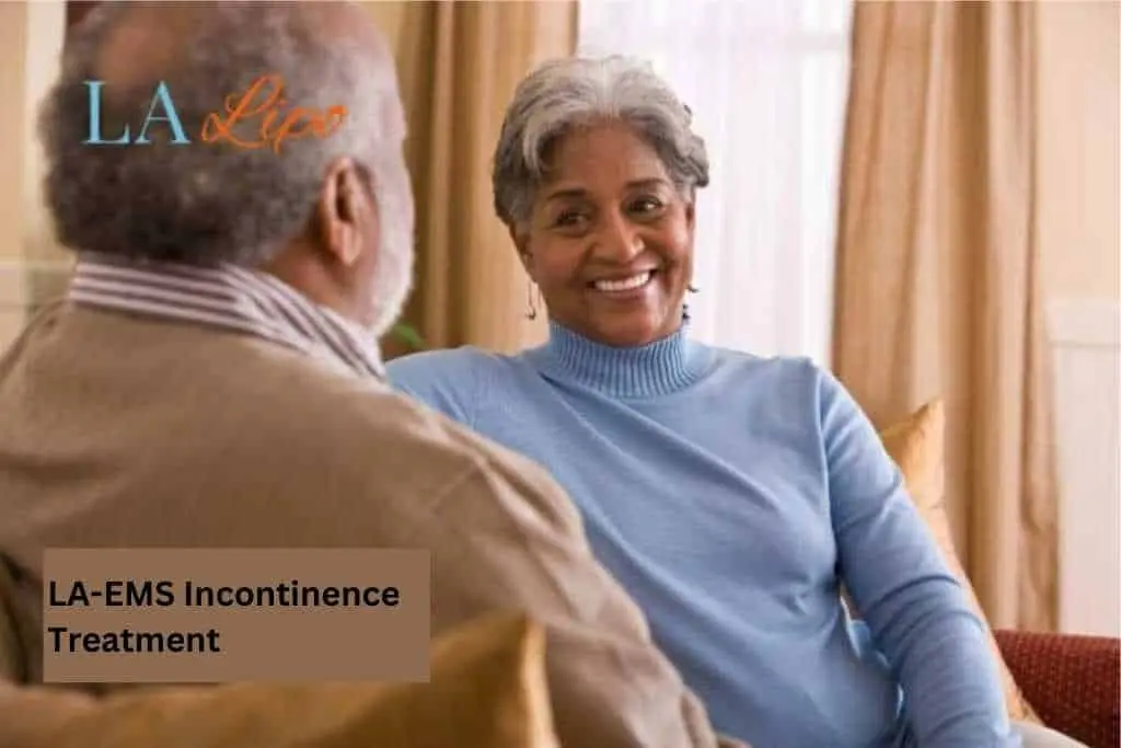 Couple sat smiling at each other - LA-EMS treatment Plaistow