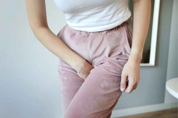 woman running for the toilet because of urinary incontinence Plaistow
